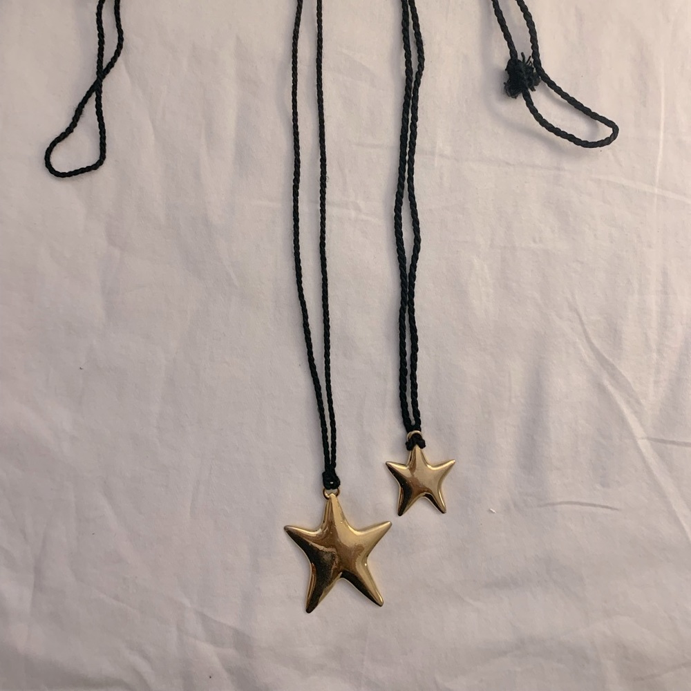 Two Gold Star Nexklaces on Black String